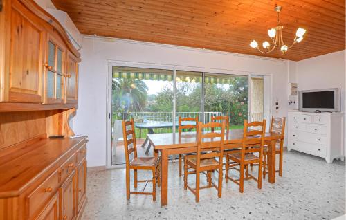 TV a/nebo společenská místnost v ubytování Villa Plage À Pieds