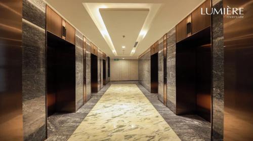 a hallway of a hotel with at Sarene Lumiere Riverside Thao Dien in Ho Chi Minh City