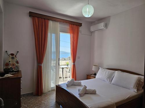 Postel nebo postele na pokoji v ubytování Oni Apartment
