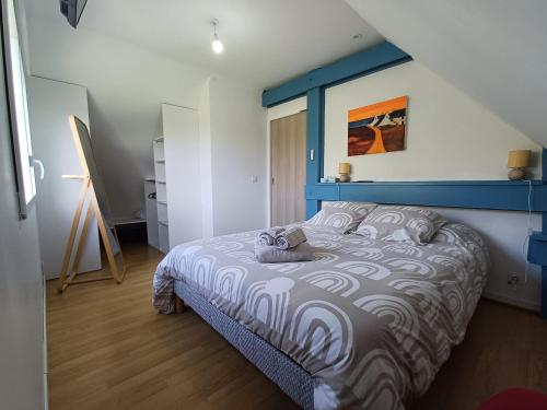 En eller flere senge i et værelse på Maison de vacances 4 Pers avec jardin privatif à 1km PLAGE Lines et 300m de la mer de Gâvres - AR PIL JADUR