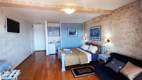 TV a/nebo společenská místnost v ubytování Medin Apartments BluVista