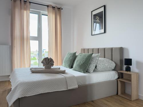 Ένα ή περισσότερα κρεβάτια σε δωμάτιο στο Legnicka Residence 36