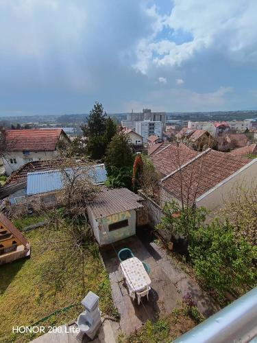 a view of a city from a roof top at Udobna Soba Sa Prelepim Pogledom #4 in Mladenovac
