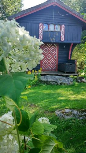 Κήπος έξω από το Authentic Norwegian Cottage
