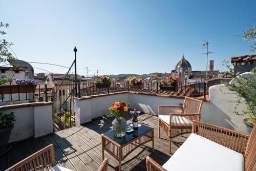 Un balcón o terraza en Residenza Conte di Cavour & Rooftop