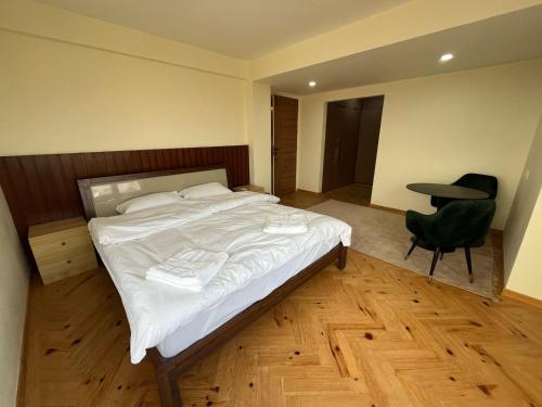 Una cama o camas en una habitación de Panipokhari Stay by SAMS