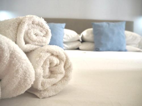 Postel nebo postele na pokoji v ubytování Room Center Sorrento Baby