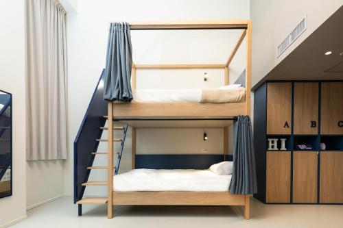 a bunk bed in a room with two beds at NEW OPENING 2025 aparto Florence Manifattura in Florence