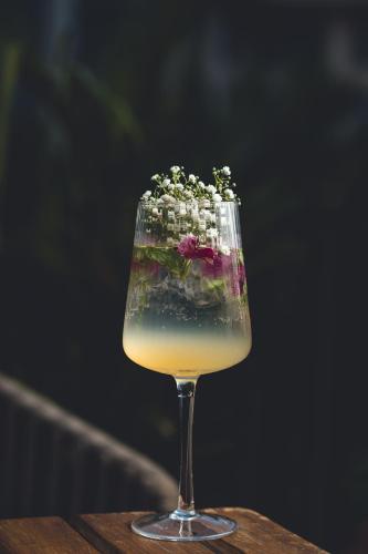 a drink in a wine glass sitting on a table at The Westin Goa in Vagator