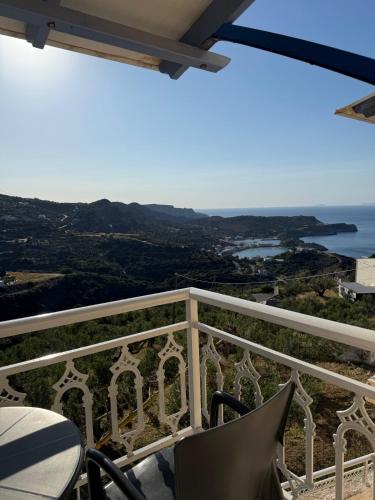 a balcony with a view of the ocean at Belvedere Studios in Kýthira