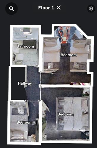 four pictures of a room with a bed and a bathroom at Stylish 3-Bed house NEC-JLR-Airport-HS2-Driveway in Birmingham