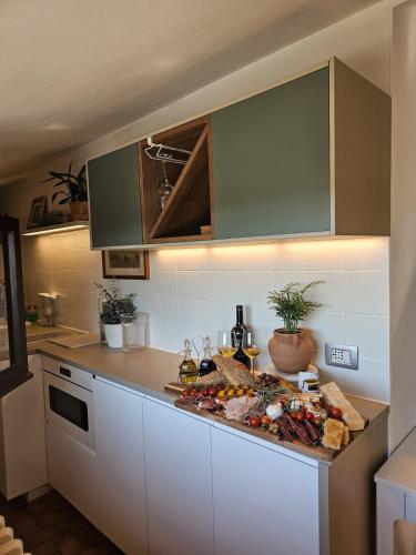 a kitchen with a counter with food on it at La dolce vita Giove apartment in Giove