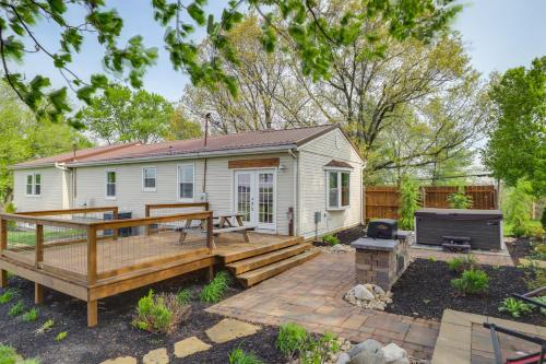 a house with a large deck and a grill at Dry Ridge Rental Home with Hot Tub and Game Room! in Dry Ridge