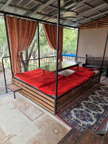 Voodi või voodid majutusasutuse Загородный дом toas