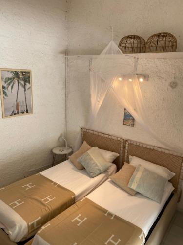 Ένα ή περισσότερα κρεβάτια σε δωμάτιο στο Seaview Villa, 4 bedrooms, 5 min walk to beach