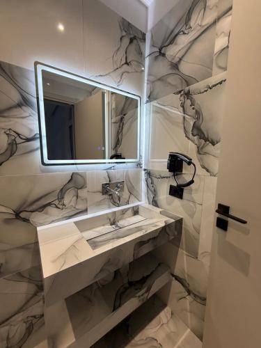Un baño de Maison Apartments