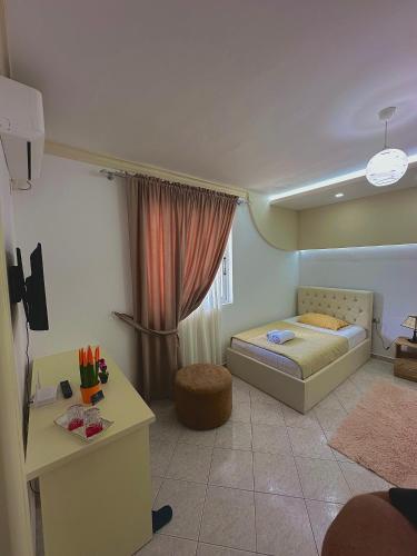 Un pat sau paturi într-o cameră la Villa Braho