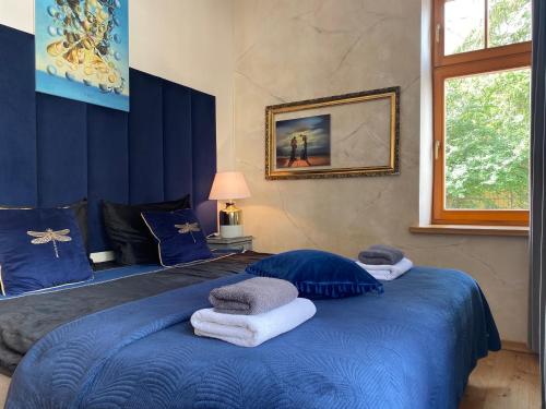 Ένα ή περισσότερα κρεβάτια σε δωμάτιο στο Dali ApartHOTEL
