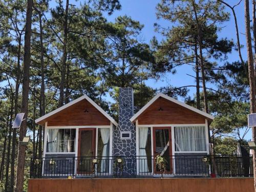 a tiny house in the woods at Gemstone Villa Măng Đen in Kon Plong