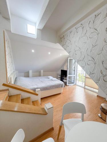 Ένα ή περισσότερα κρεβάτια σε δωμάτιο στο Hotel Kalyan & Spa