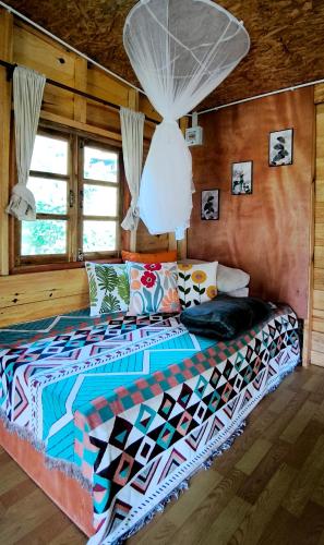 Katil atau katil-katil dalam bilik di PeaMoo Homestay
