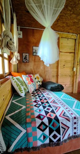 Katil atau katil-katil dalam bilik di PeaMoo Homestay
