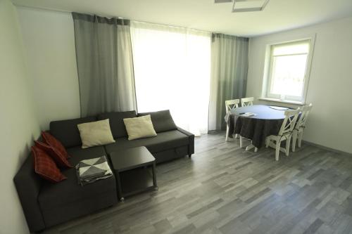 Posezení v ubytování Casa-Casa Linthal
