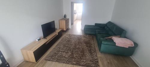 Μια τηλεόραση ή/και κέντρο ψυχαγωγίας στο Apartament 2 pokoje