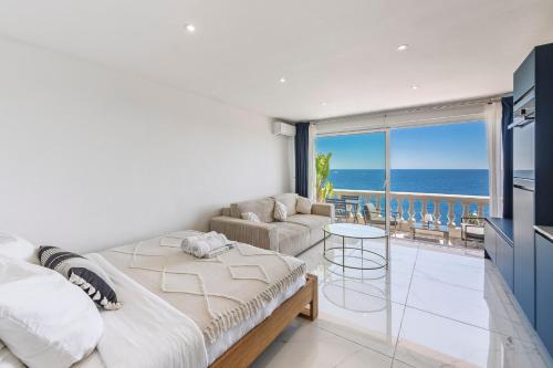 Postel nebo postele na pokoji v ubytování TRÉSOR d ANTHEOR- Bord de mer