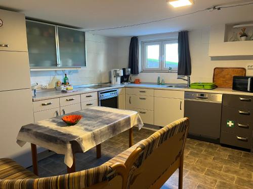 Kuchyň nebo kuchyňský kout v ubytování Apartment Staudacker