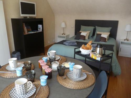 Postel nebo postele na pokoji v ubytování Au gré des marées, 1 chambre avec petit déjeuner