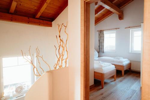 Ένα ή περισσότερα κρεβάτια σε δωμάτιο στο Chalet Bergglück