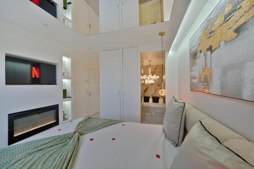 Ένα ή περισσότερα κρεβάτια σε δωμάτιο στο Luxury Dolce Jacuzzi