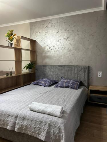 En eller flere senge i et værelse på ALA Park