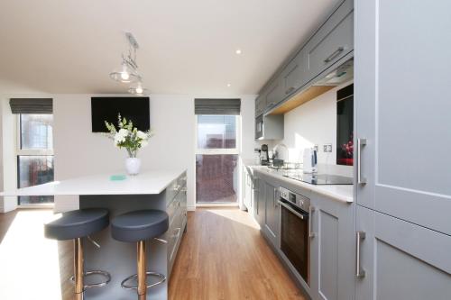 Η κουζίνα ή μικρή κουζίνα στο Swift Apartments York