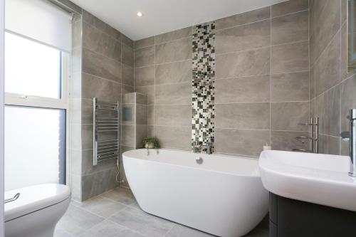 Ένα μπάνιο στο Swift Apartments York
