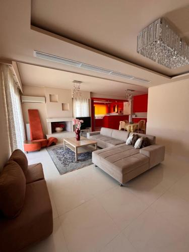 Χώρος καθιστικού στο Glamour beautique villa