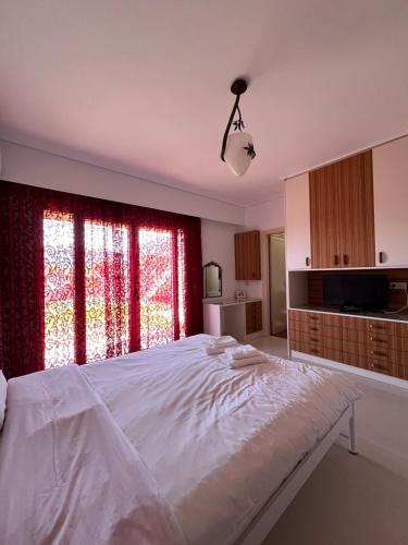 Ένα ή περισσότερα κρεβάτια σε δωμάτιο στο Glamour beautique villa