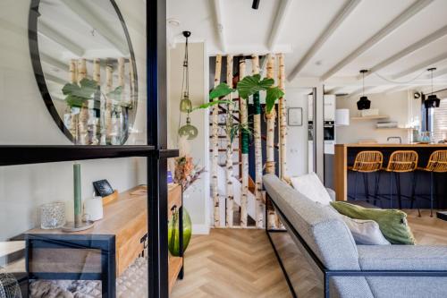 Posezení v ubytování Kluut I Prachtige Woning met Sauna en Openhaard