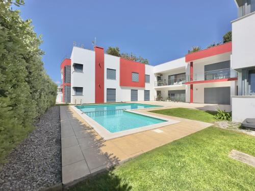 an image of a house with a swimming pool at Secret Spot Baleal - Luxury Flat in Ferrel