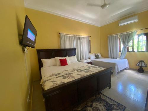 Кровать или кровати в номере Hotel vista del mar