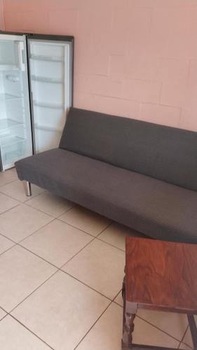 a bed sitting on top of a room at Cabañas bosques de horcon in Puchuncaví