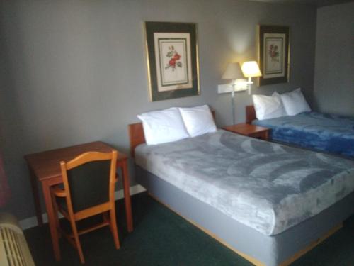 Ένα ή περισσότερα κρεβάτια σε δωμάτιο στο 1 Full Bed Hotel Studio 214