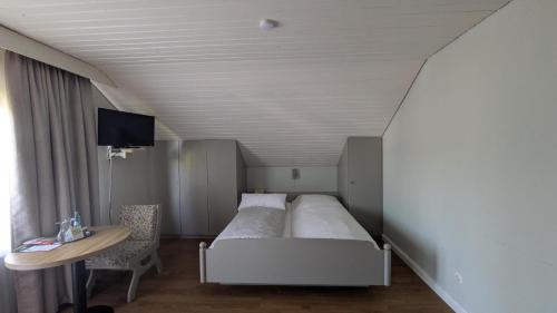 Postel nebo postele na pokoji v ubytování Landhotel Sonneneck - Breuna im Naturpark
