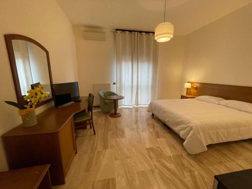 Postel nebo postele na pokoji v ubytování Hotel Clementi