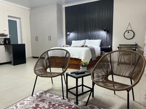L&C Cottage tesisinde bir odada yatak veya yataklar