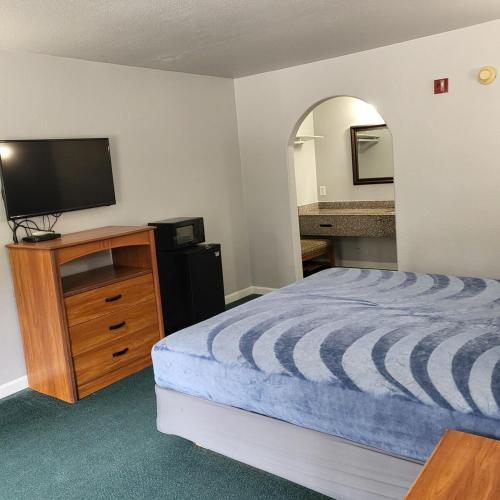 Ένα ή περισσότερα κρεβάτια σε δωμάτιο στο King Bed Hotel Studio 219
