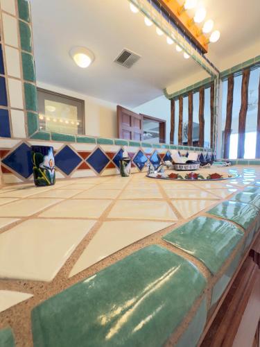 a large room with a tile floor in a building at El Ojo del Mar - Las Conchas in Puerto Peñasco