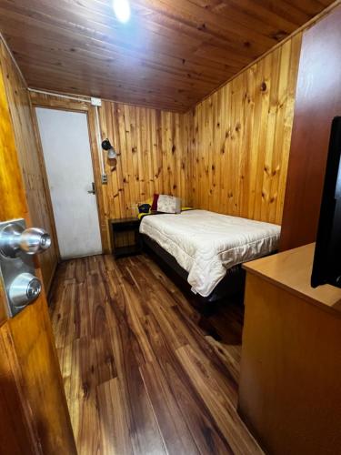Hostal Ginaにあるベッド
