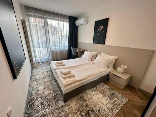 Llit o llits en una habitació de Milea apartments